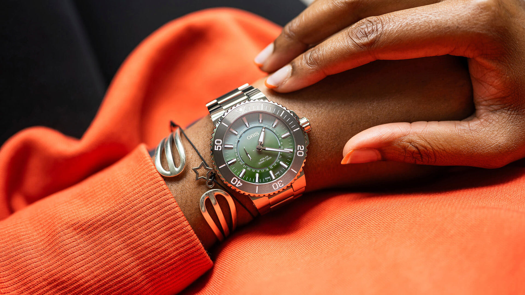 Oris aquis wrist shot top