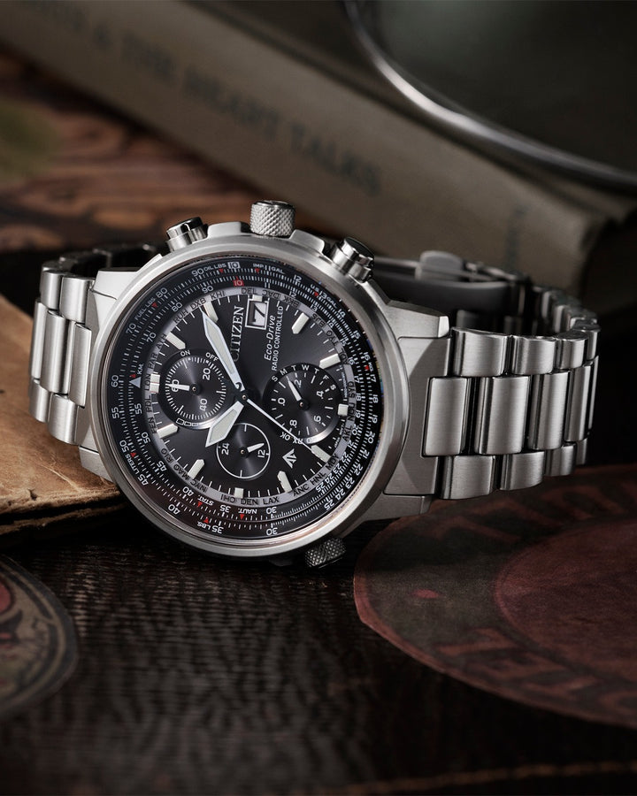 Citizen AT8300-58E Promaster chronograph watch detail showing black dial and chronograph subdials