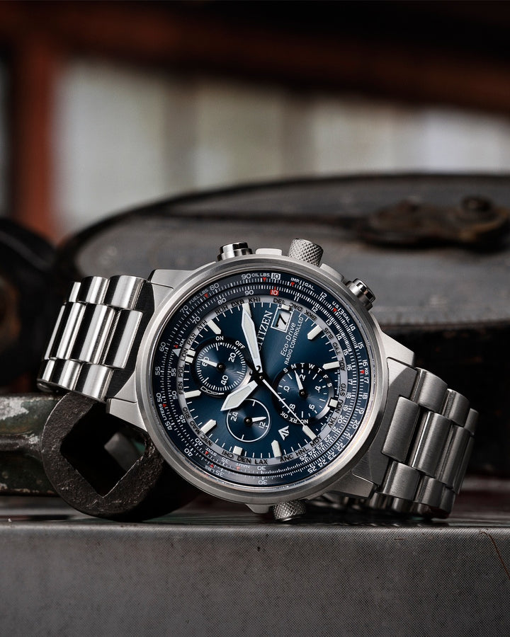 Citizen AT8300-58L Promaster chronograph watch detail showing blue dial and chronograph subdials