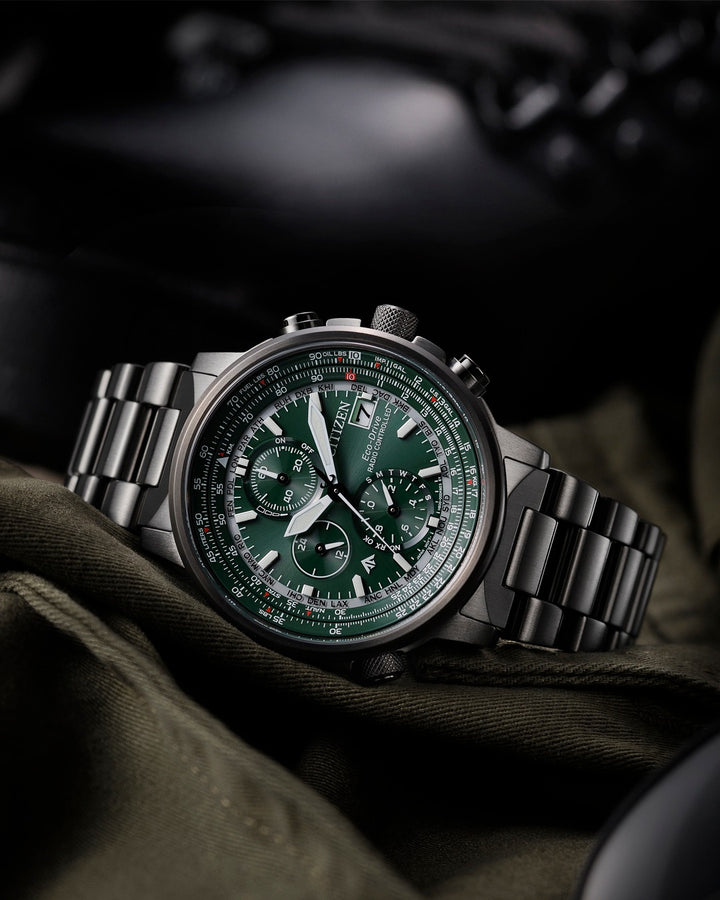 Citizen AT8304-57W Promaster chronograph watch detail showing green dial and chronograph subdials