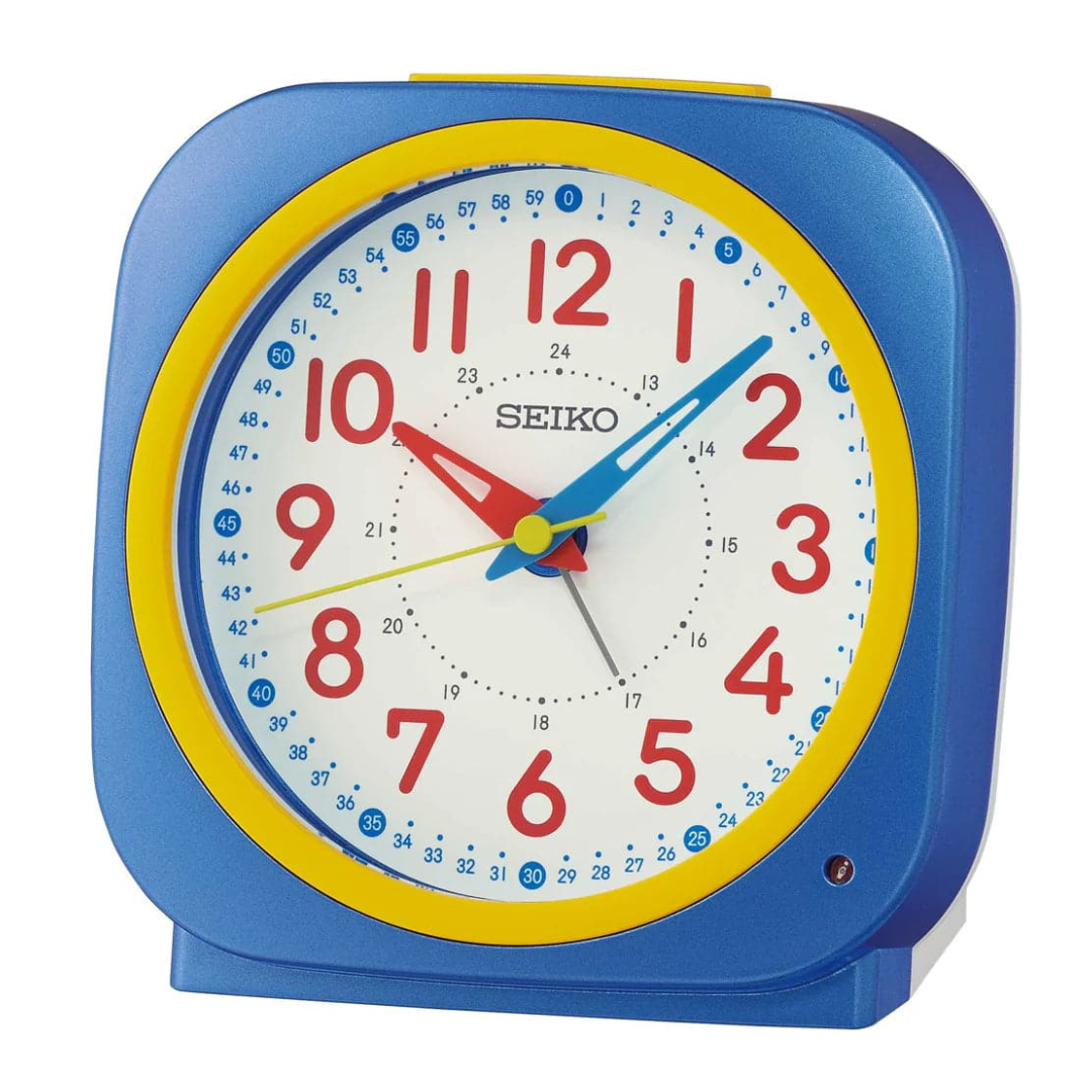 seiko blue and yellow alarm clock with red accents front view