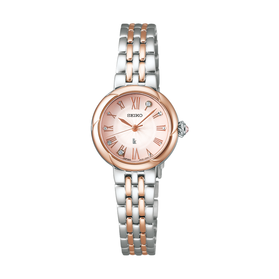 seiko lukia 3 hands quartz with silky pink dial and lab grown diamonds in roman numerals two-tone stainless steel bracelet women watch front view