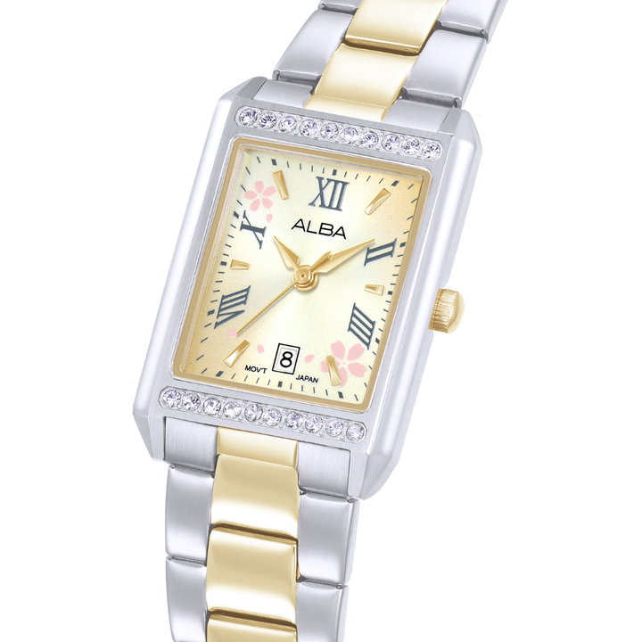 Alba AH7EZ9X side profile — two-tone silver and gold rectangular case with crystal bezels
