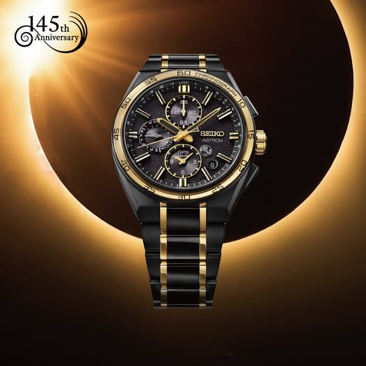 Seiko Astron SSH186J1 145th Anniversary GPS Solar limited edition — black and gold titanium watch set against solar eclipse backdrop with 145th Anniversary badge