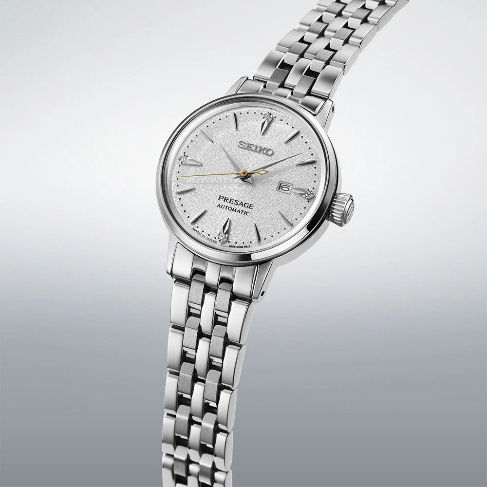 Seiko SRE017J1 Cocktail Time silver dial detail with four genuine diamond hour markers