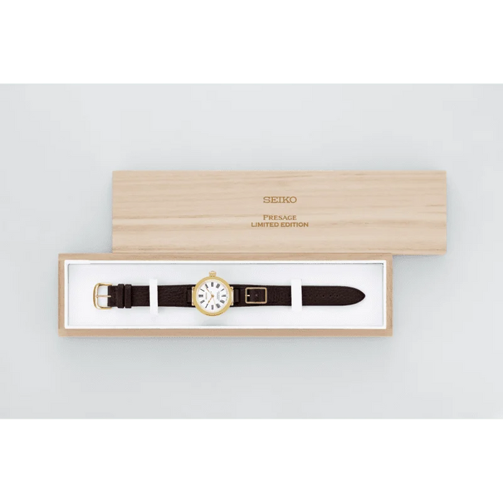 Seiko Presage SPB538J1 145th Anniversary limited edition in special paulownia wood presentation box — Seiko Presage Limited Edition engraving on lid, white enamel dial watch inside