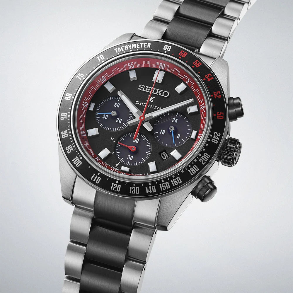 Seiko Prospex Speedtimer SSC957P1 Datsun 240Z limited edition — black dial with red chronograph seconds hand, tachymeter bezel, three subdials and date window, 3/4 angle view