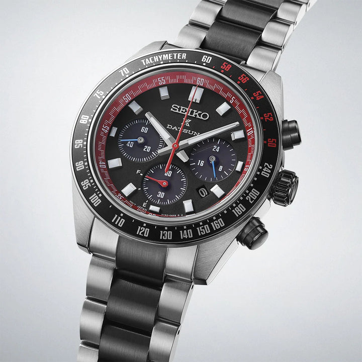 Seiko Prospex Speedtimer SSC957P1 Datsun 240Z limited edition — black dial with red chronograph seconds hand, tachymeter bezel, three subdials and date window, 3/4 angle view