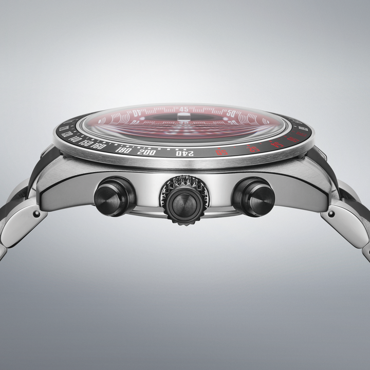 Seiko Prospex Speedtimer SSC957P1 case side profile — black PVD-coated crown and chronograph pushers with tachymeter bezel and red inner ring detail