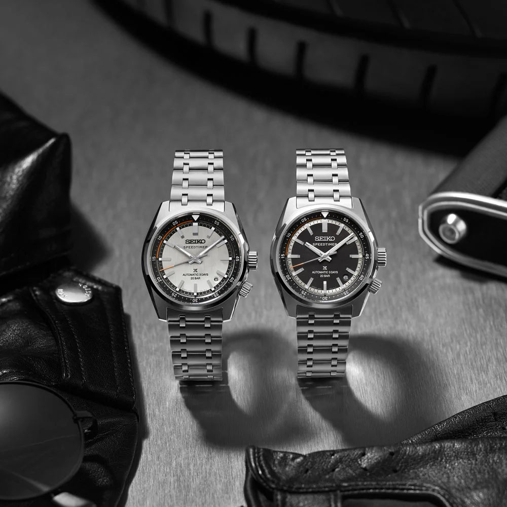 Seiko Prospex Speedtimer collection — white dial SPB513J1 and black dial SPB515J1 automatic watches with stainless steel bracelets, styled with motorcycle gear