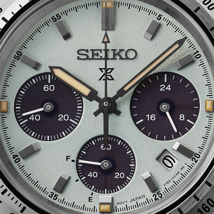 Seiko Prospex Speedtimer SSC965P1 dial close-up — mint green textured dial with dark sub-dials, LumiBrite arrow hands, power reserve indicator and date window